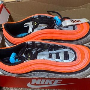 Nike Kids' Vibrant Orange and Black Sneakers